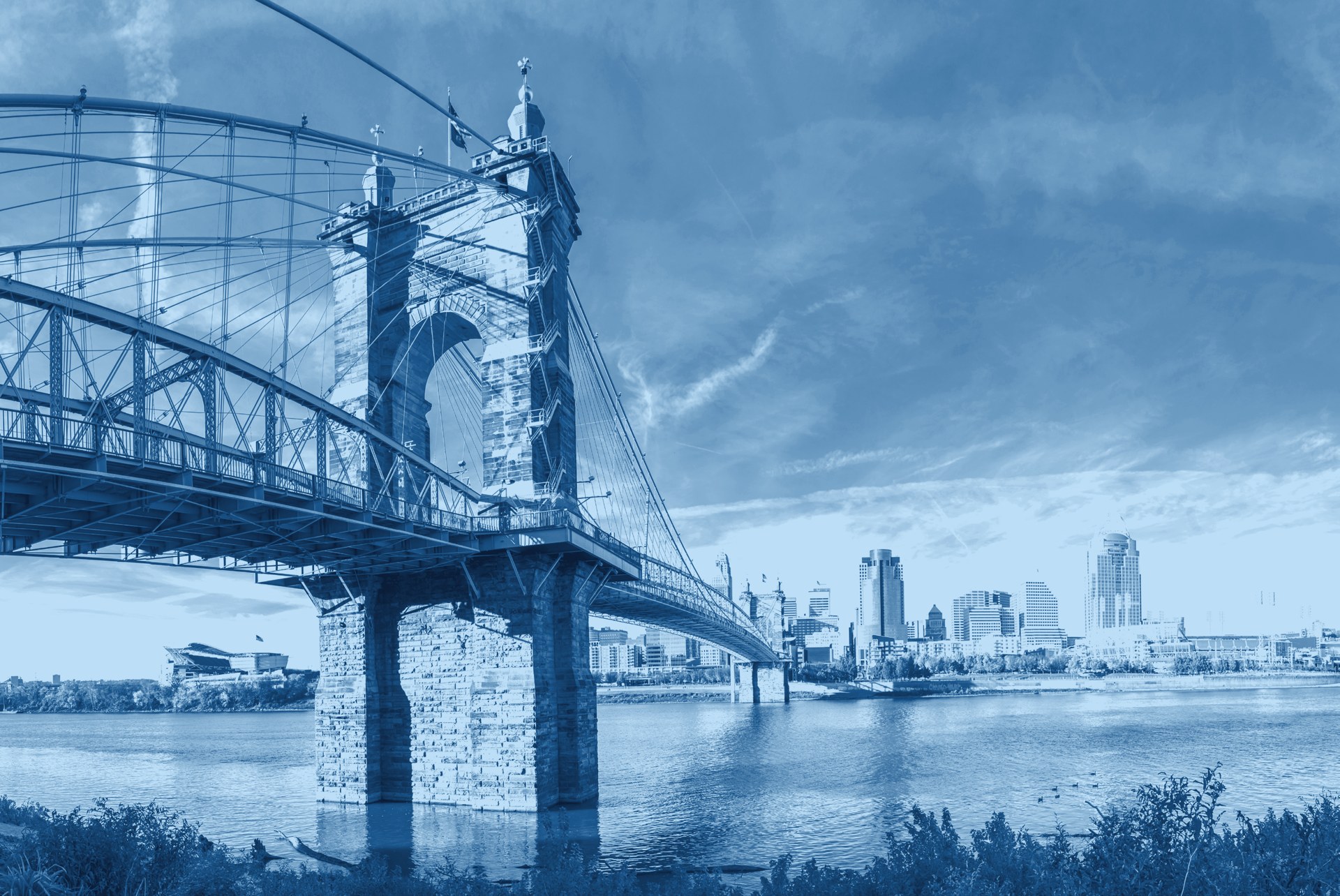 Cincinnati skyline and the Roebling Bridge at dusk